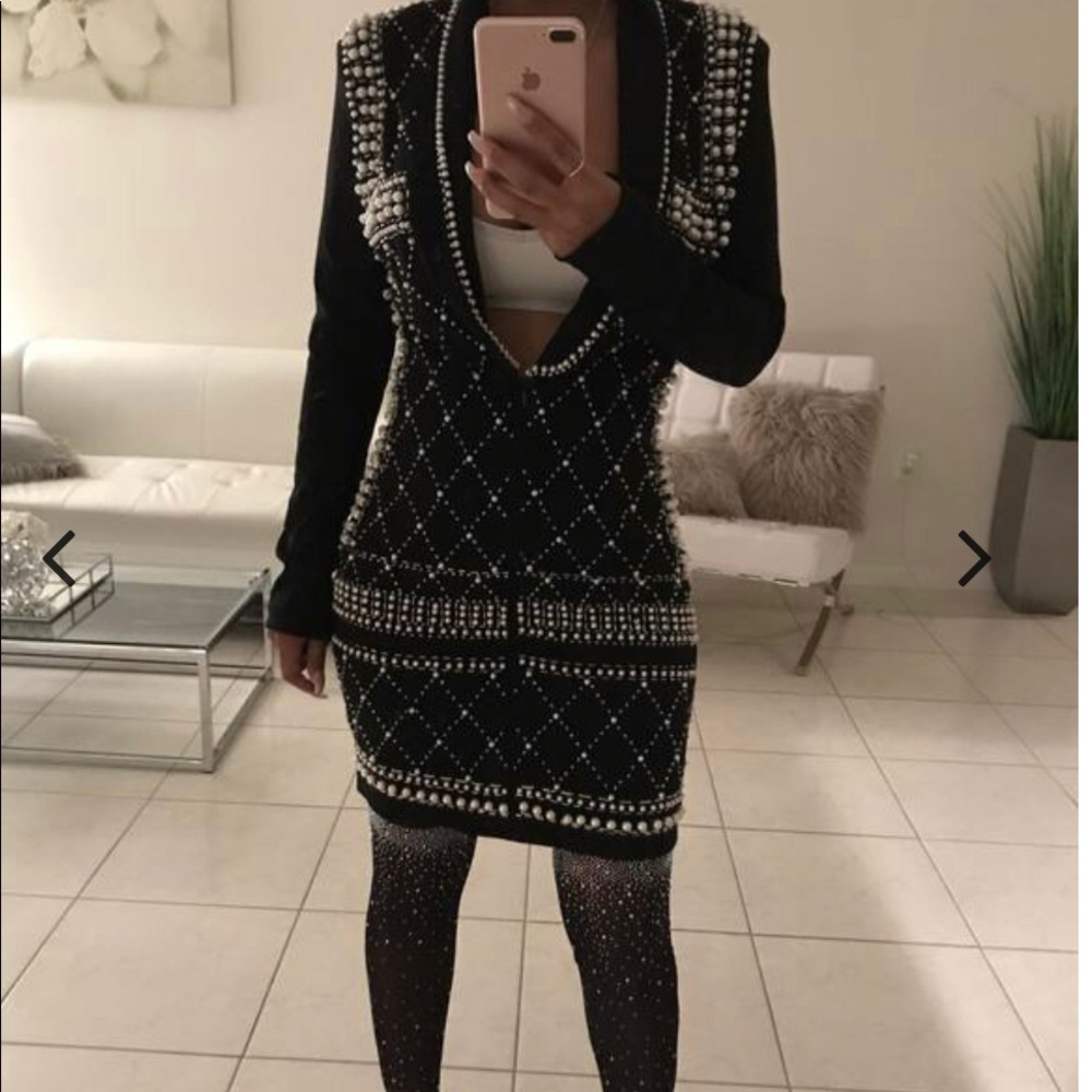 Beaded blazer style dress.